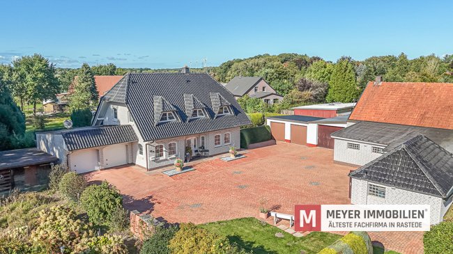 Familienfreundliches Einfamilienhaus mit separater Gewerbefläche in Jaderberg (Obj.-Nr. 6536) Familienfreundliches Einfamilienhaus mit separater Gewerbefläche in Jaderberg (Obj.-Nr. 6536)